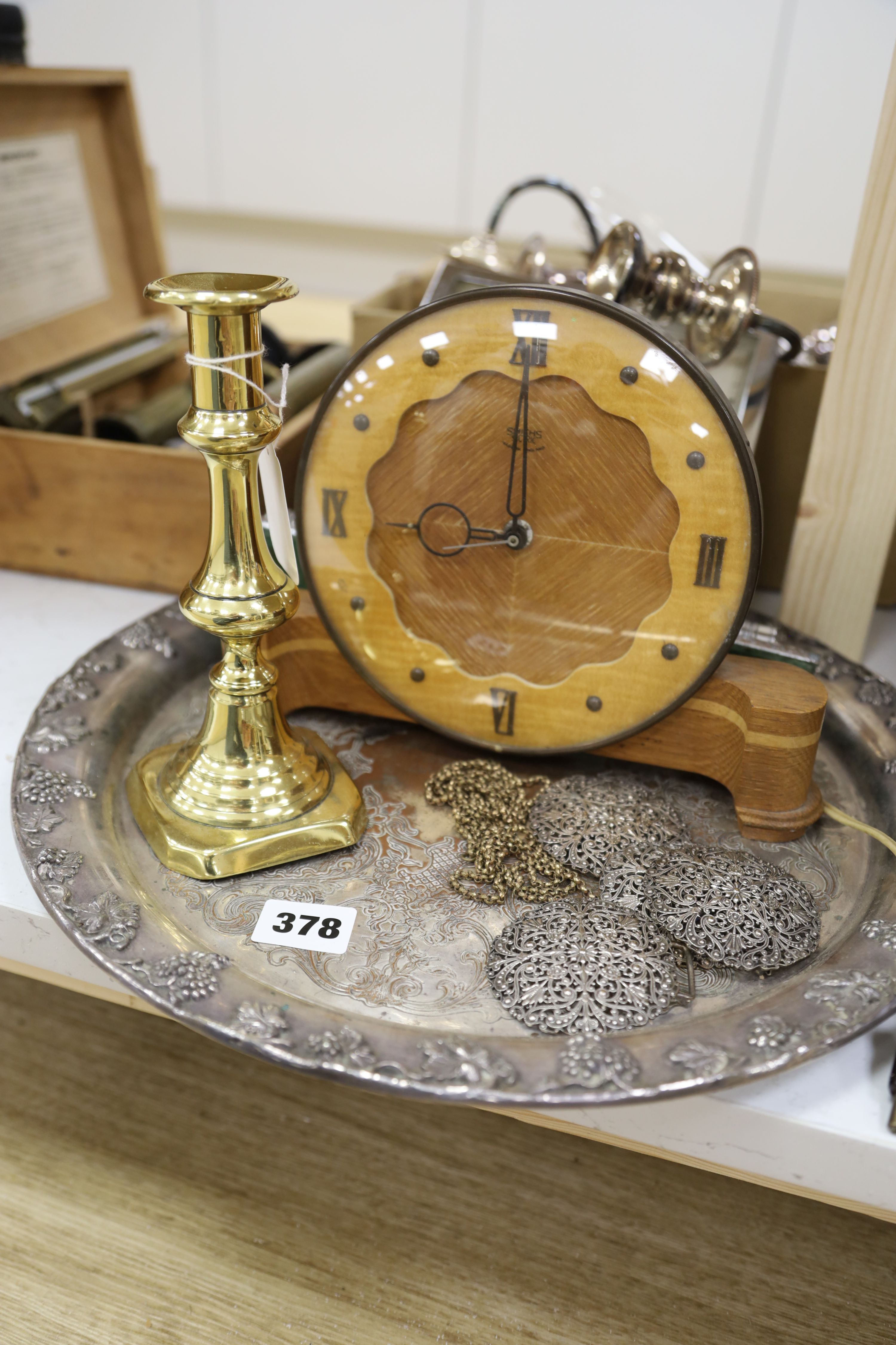 A quantity of silver plated cutlery pair of two branch three light candelabra and tray, Art Deco chrome clock, similar wooden clock, Fr